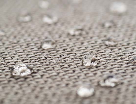 Hydrophobic coating on carpets repels soil, too