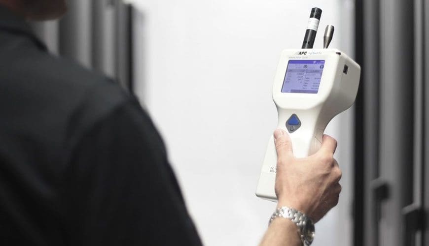 a person checking air quality inside a house.